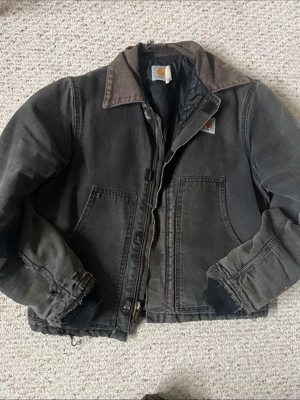 Distressed vintage Carhartt jacket